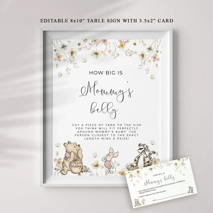 Winnie The Pooh baby shower sign with flowers, reads "How Big is Mommy's Belly?" with Pooh, Piglet, Tigger illustrations.